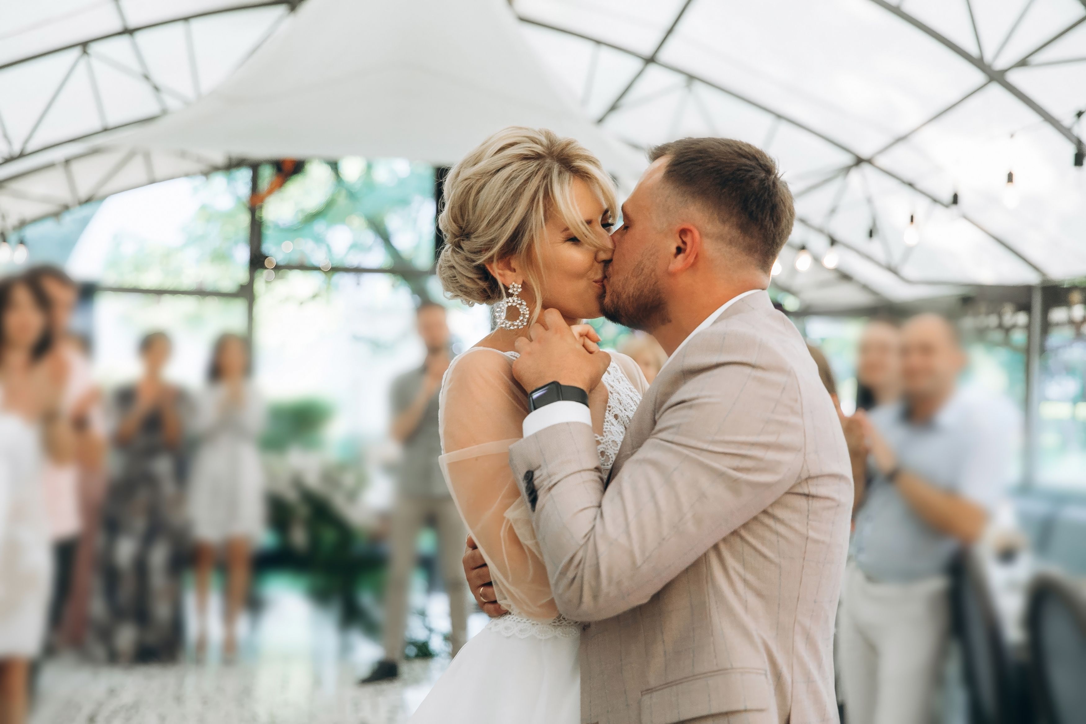 bride-groom-dancing-first-wedding-dance-against-background-guests-evening-restaurant.jpg
