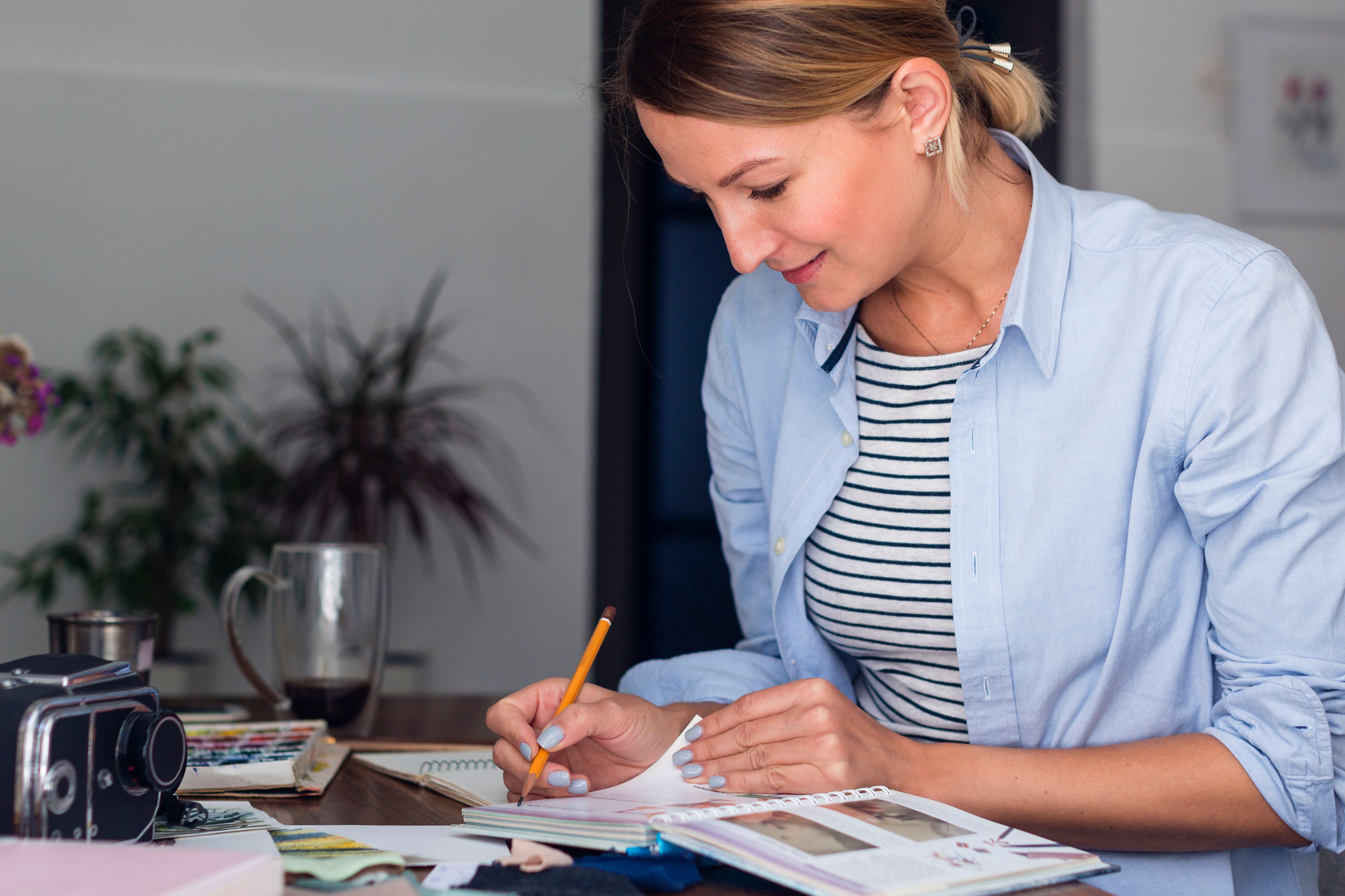 casual-woman-writing-notebook.jpg