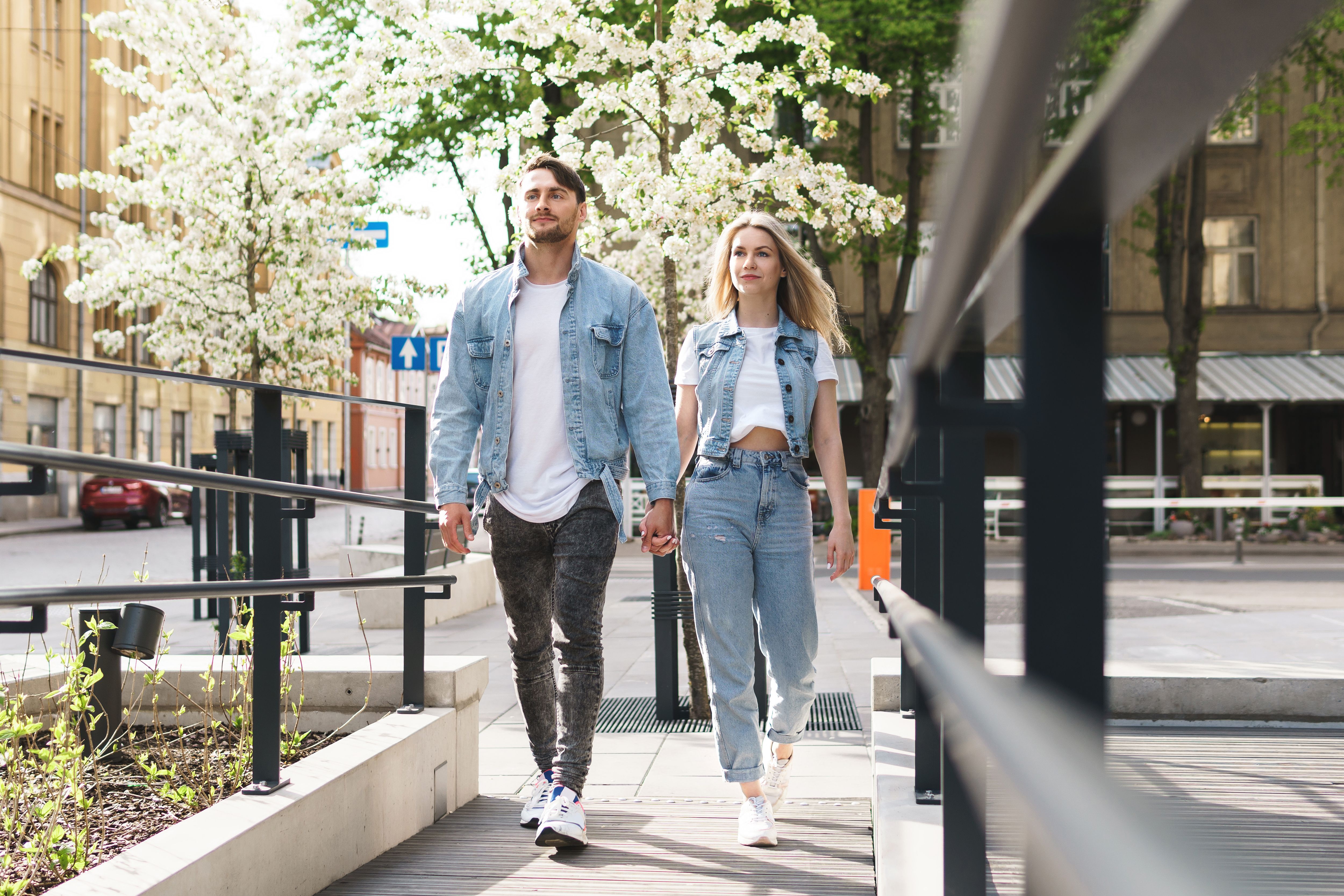 portrait-young-confident-loving-couple-wearing-denim-outfits-walking-their-date-city-street.jpg