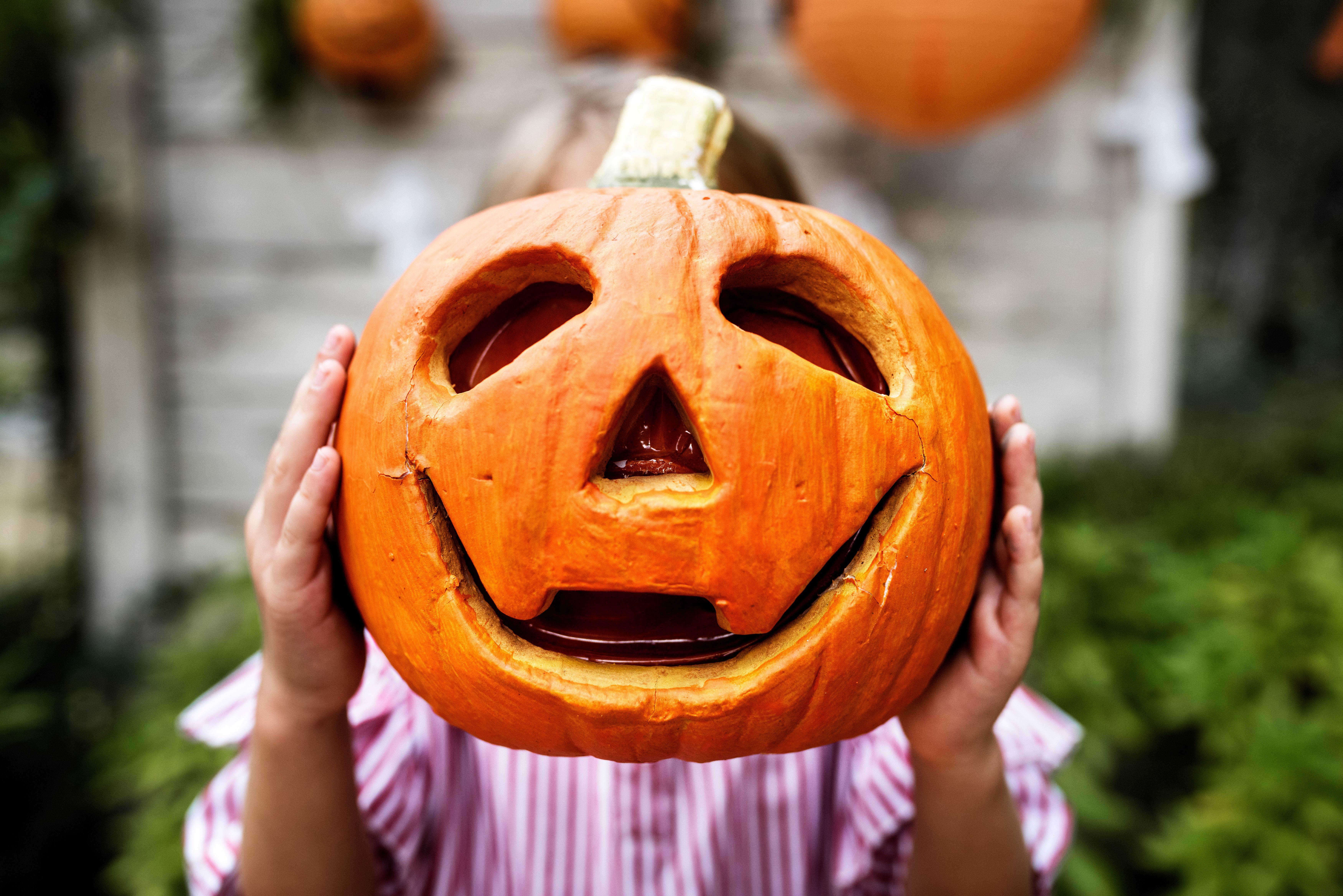 young-playful-girl-enjoying-halloween.jpg